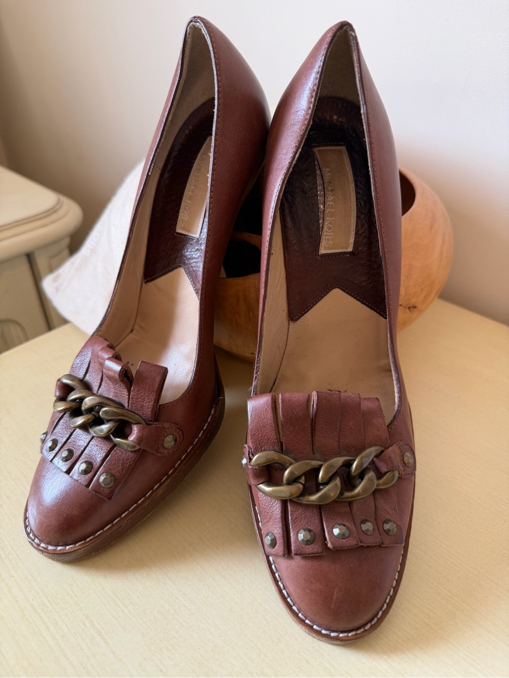 Michael Kors Brown Leather Fringe Pumps with Chain Accent